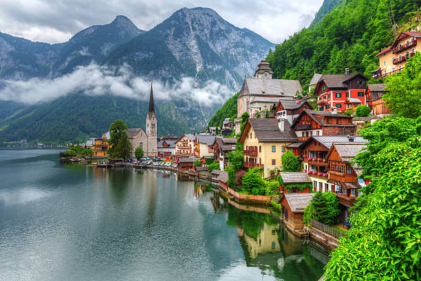 Hallstatt village in Alps at cloudy day, Austria